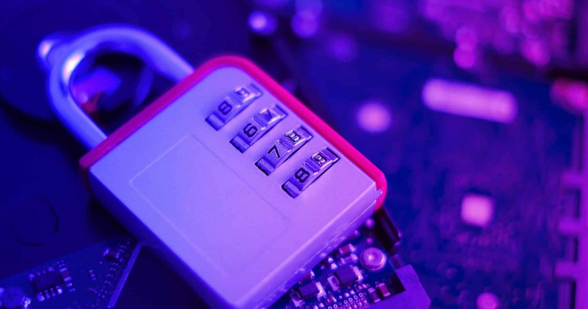 Encrypted hard disk. Padlock with cipher on an opened hard disk. Data loss. computer motherboard. the concept of data, hardware, information technology and cyber security