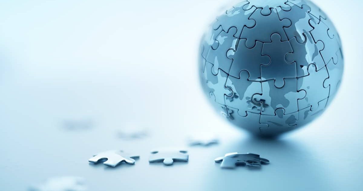 Global strategy solution concept - earth jigsaw puzzle